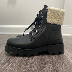 Brand new women’s combat boot with a fuzzy collar